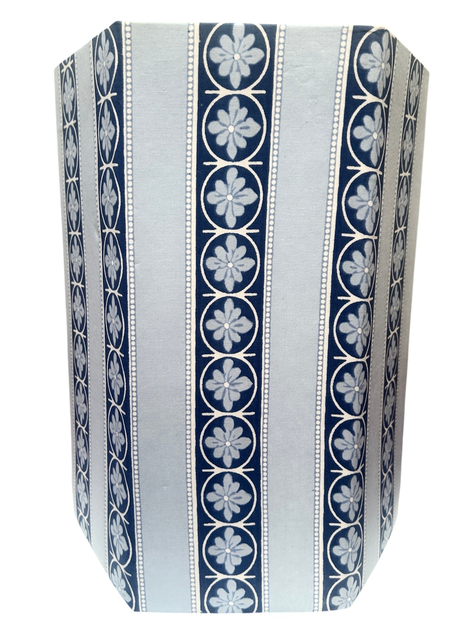 Close up of the Blue flower stripe hand block Printed waste paper bin handcrafted from 100% recycled cardboard by skilled artisans in Jaipur by The Charpoy on a white background with floral details