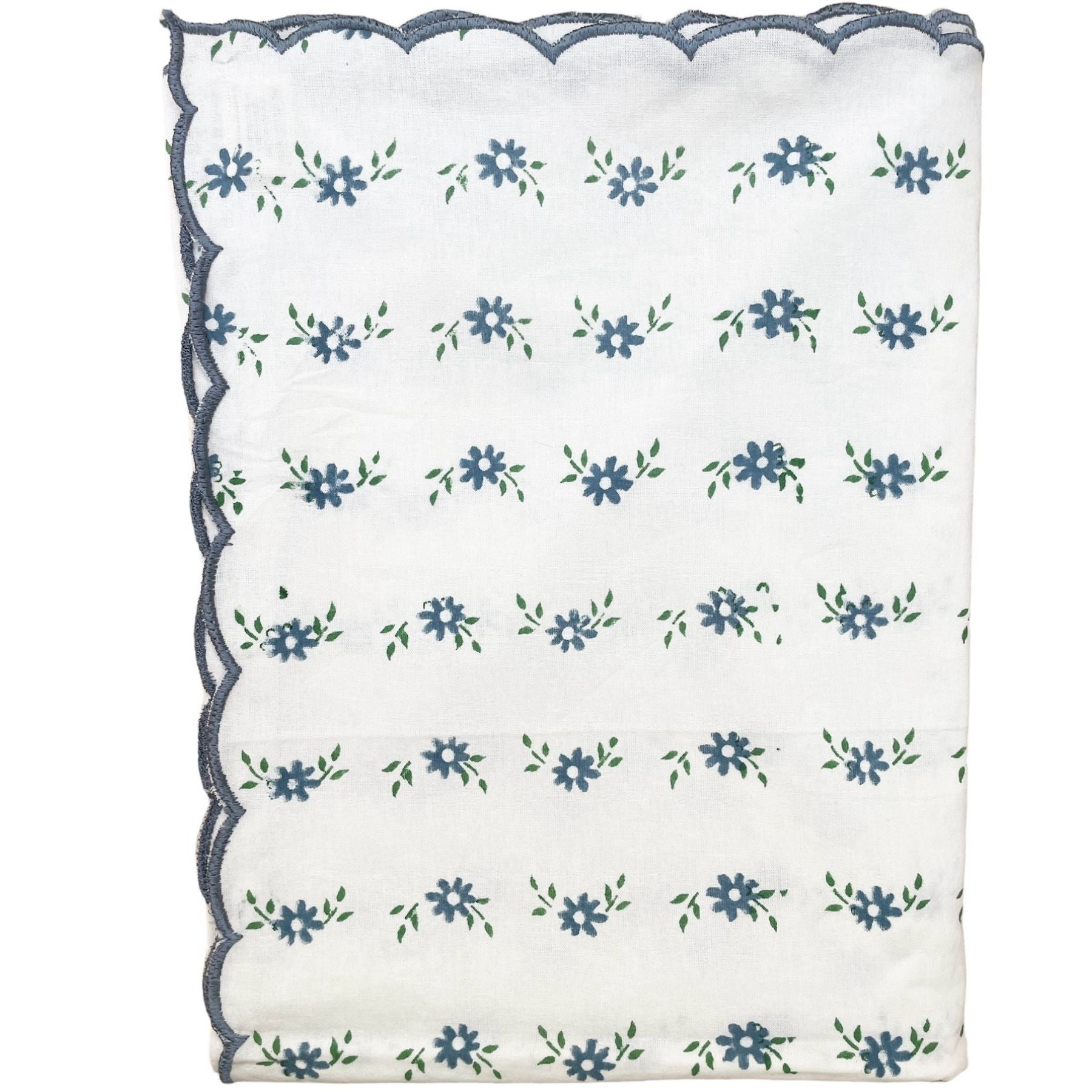 Hand block printed white tablecloth with petit blue garland motifs and embroidered scalloped edge on a white background by The Charpoy