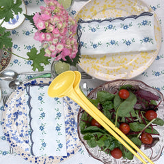 Hand block printed white tablecloth with petit blue garland motifs and embroidered scalloped edge, with matching napkins styled on a dining table by The Charpoy