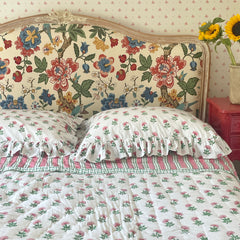 Pink And Green Carnation Hand Block Printed Quilt with matching pillows in single, king and super king sizes. handcrafted in Jaipur by The Charpoy