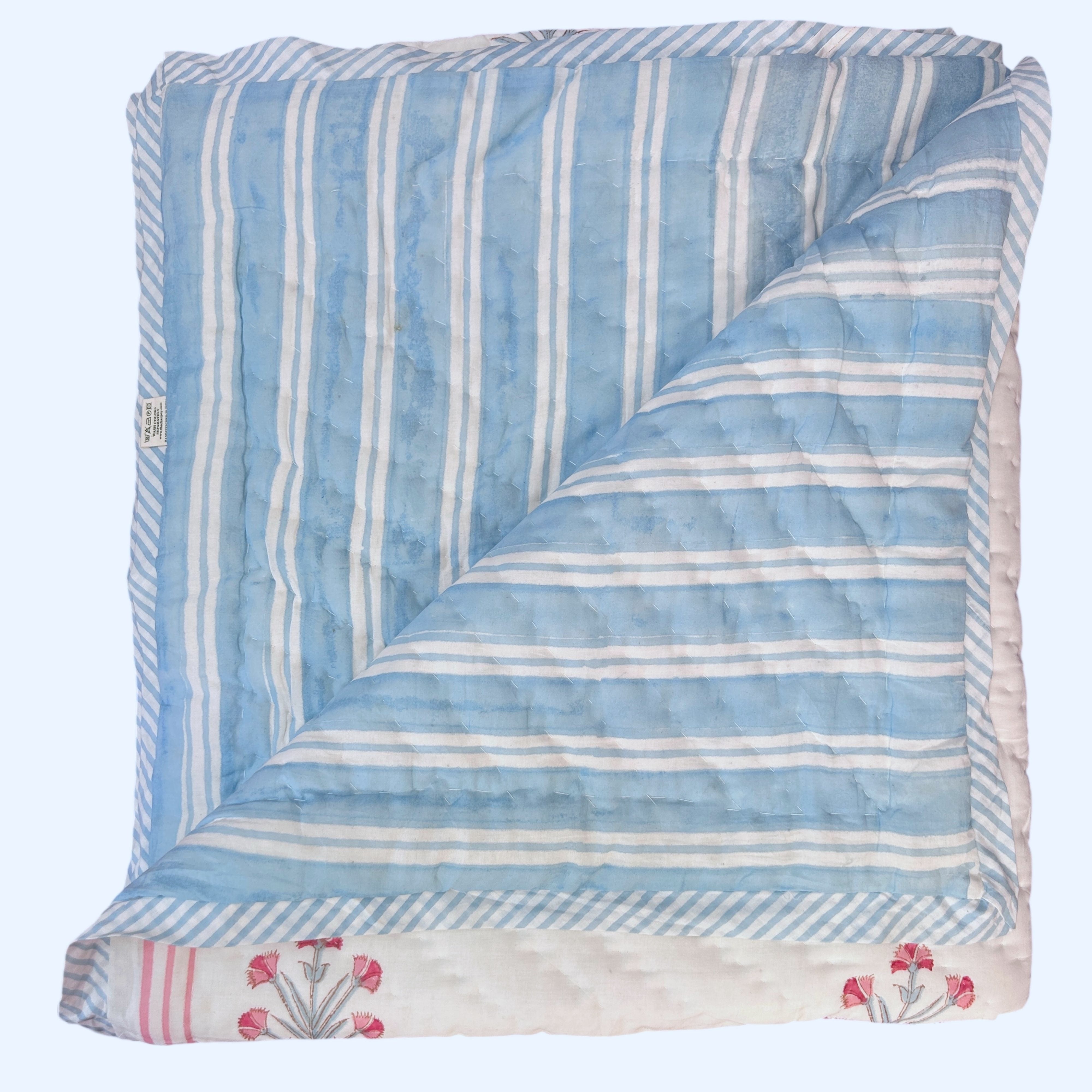 Reverse of Pink & Blue Buta Hand Block Printed cotton Quilt showing blue stripes by The Charpoy