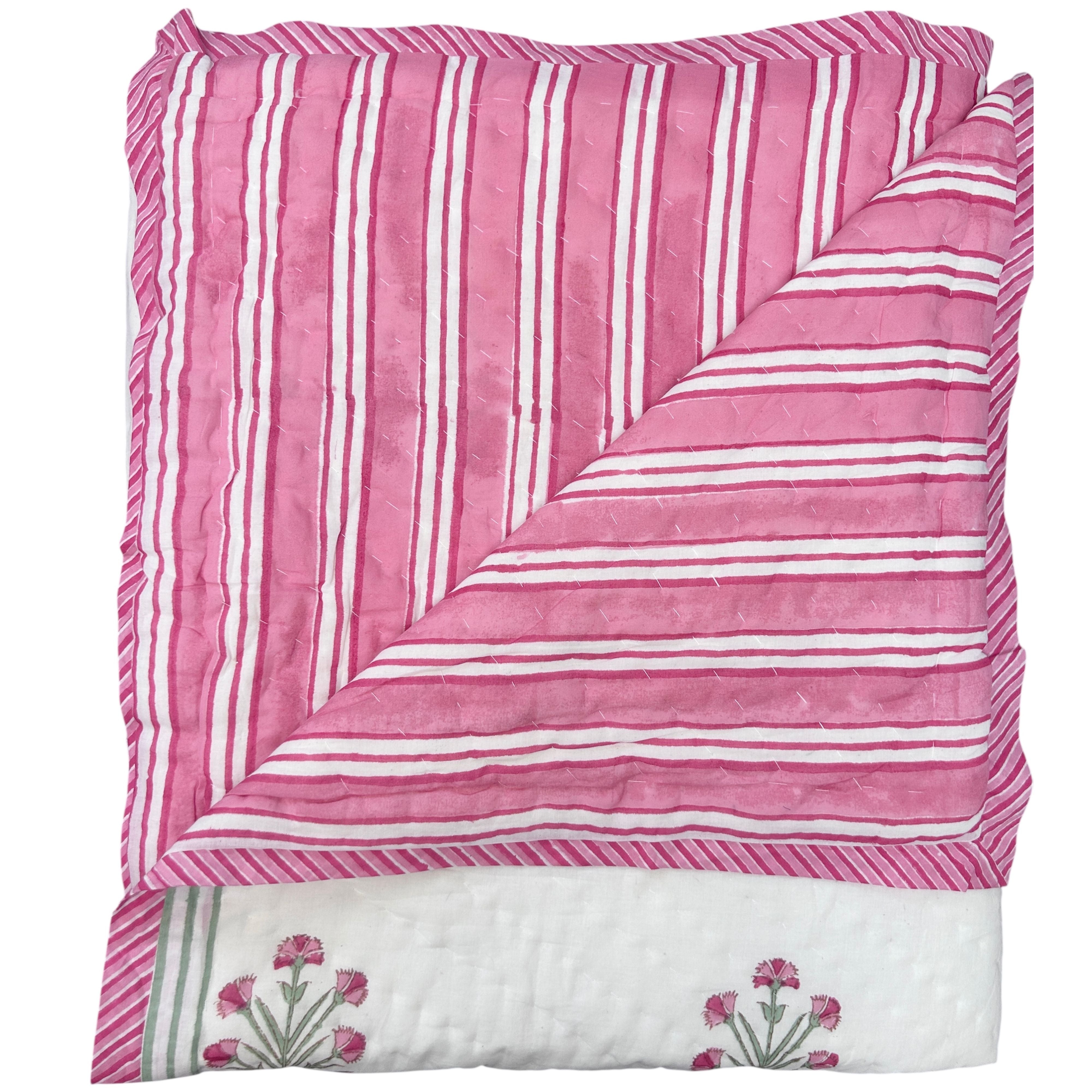Reverse of the Pink buta hand block printed Quilt with delicate pink and green motifs on a white muslin cotton, handmade in Jaipur by The Charpoy