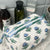 Floral-patterned toiletry bag with skincare products on a bathroom counter The Charpoy 