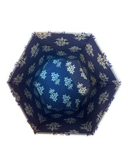 Hexagonal container with blue floral pattern on a white background