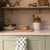 Blue Tulip Cotton Hand Towel hanging on a kitchen drawer The Charpoy  
