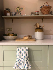 Blue Tulip Cotton Hand Towel hanging on a kitchen drawer The Charpoy  