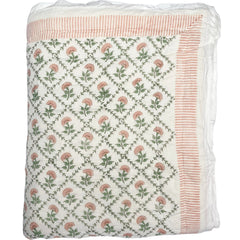 Peach Flower hand block printed Quilt on a white background by The Charpoy