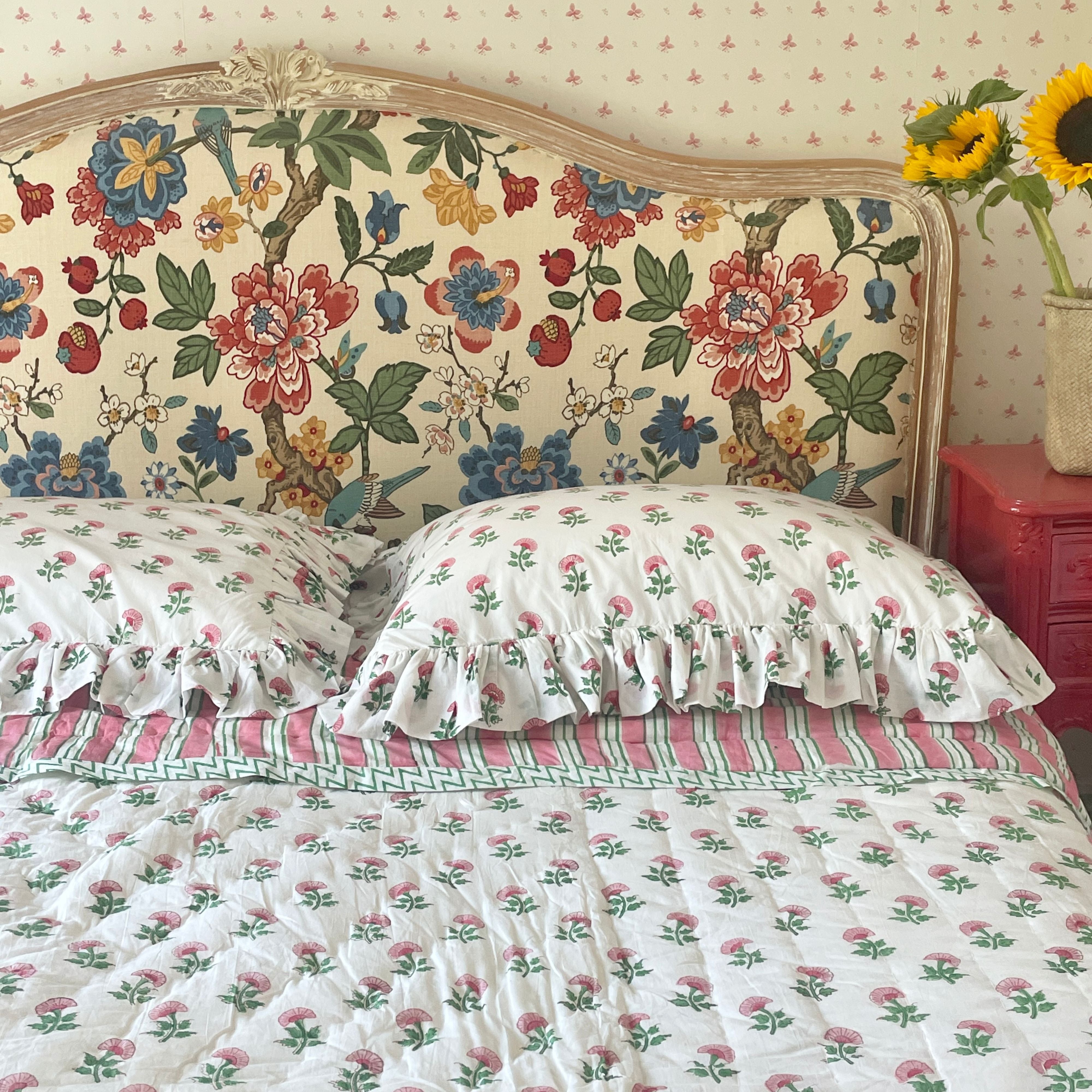 Pink And Green Carnation Hand Block Printed Quilt with matching pillows in single, king and super king sizes. handcrafted in Jaipur by The Charpoy