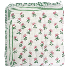Close up of Pink And Green Carnation Hand Block Printed Quilt in single, king and super king sizes. handcrafted in Jaipur by The Charpoy