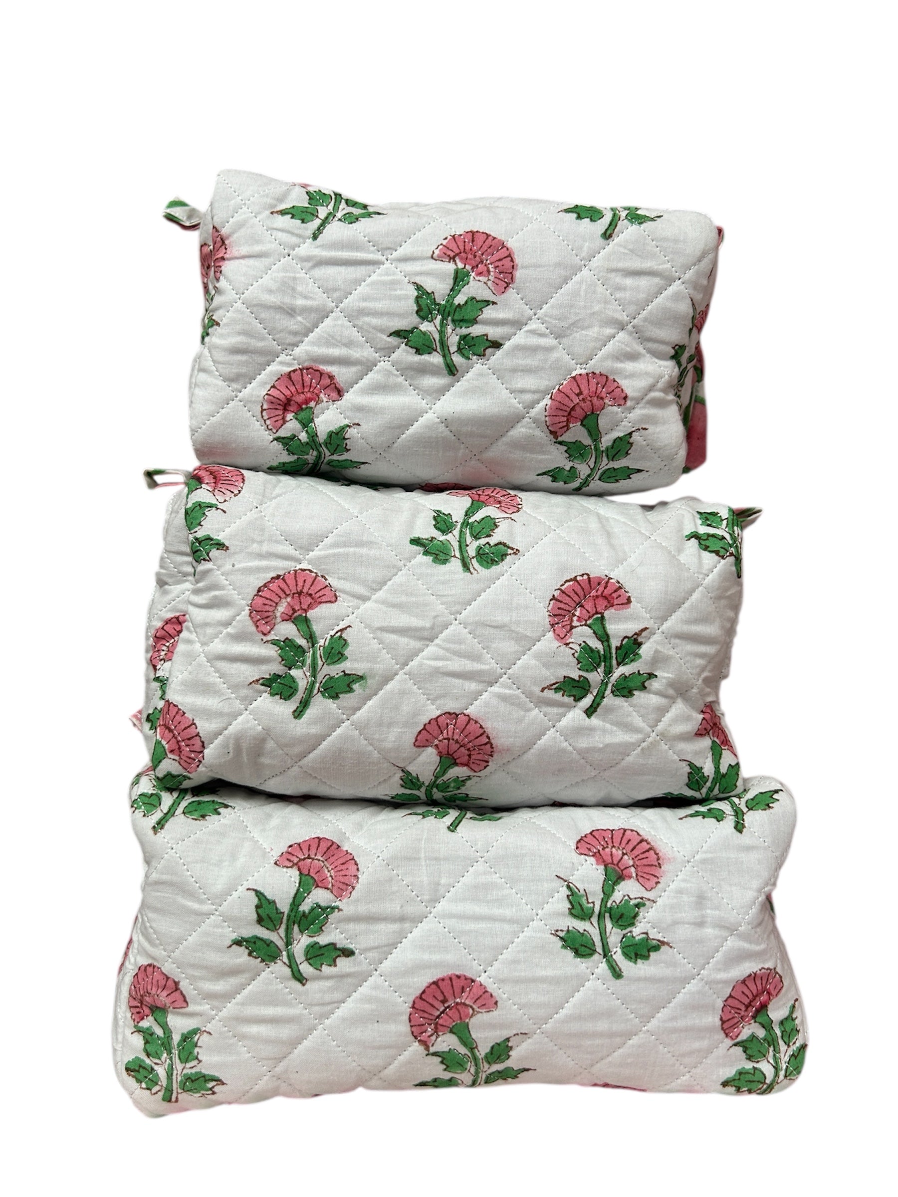 Set of three quilted Wash bags with floral patterns on a white background The Charpoy 