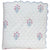 Quilted bedspread with floral hand block printed on a white background and scalloped edge The Charpoy