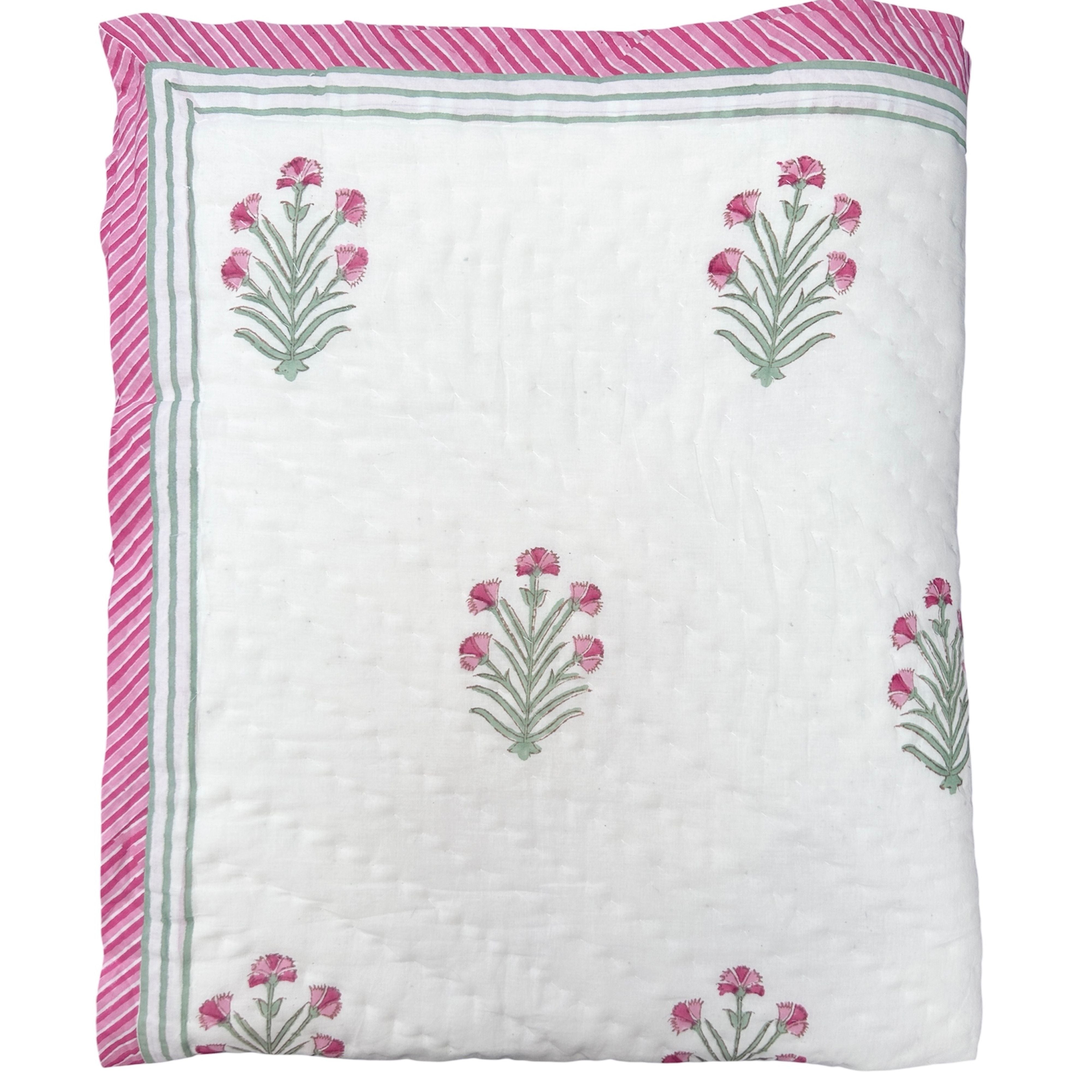 Pink buta hand block printed Quilt with delicate pink and green motifs on a white muslin cotton, handmade in Jaipur by The Charpoy