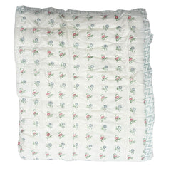 Wild Flowers Hand Block Printed cotton Quilt in white with blue and red flowers by The Charpoy